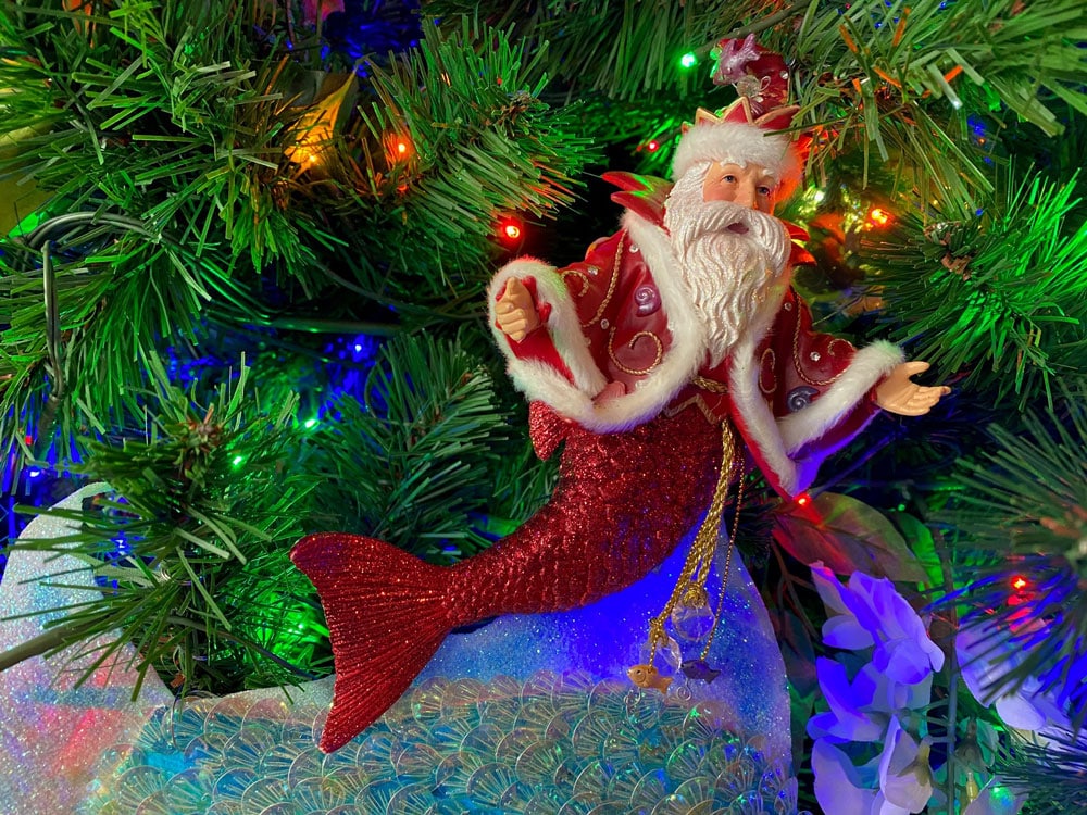 Santa Claus merman ornament on the Christmas tree in the lobby of Disney’s Old Key West Resort.