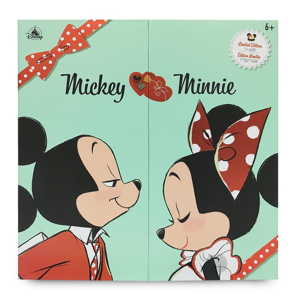 Limited-edition Mickey Mouse and Minnie Mouse doll set display case with hinged front panels decorated with confectionary