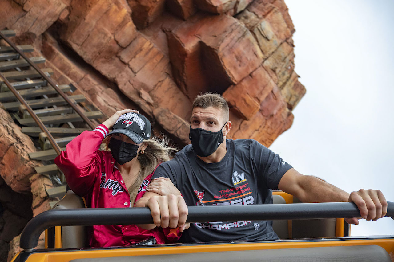 Tampa Bay Buccaneers tight end Rob Gronkowski and fiancée Camille Kostek ride Big Thunder Mountain Railroad in Magic Kingdom Park at Walt Disney World Resor