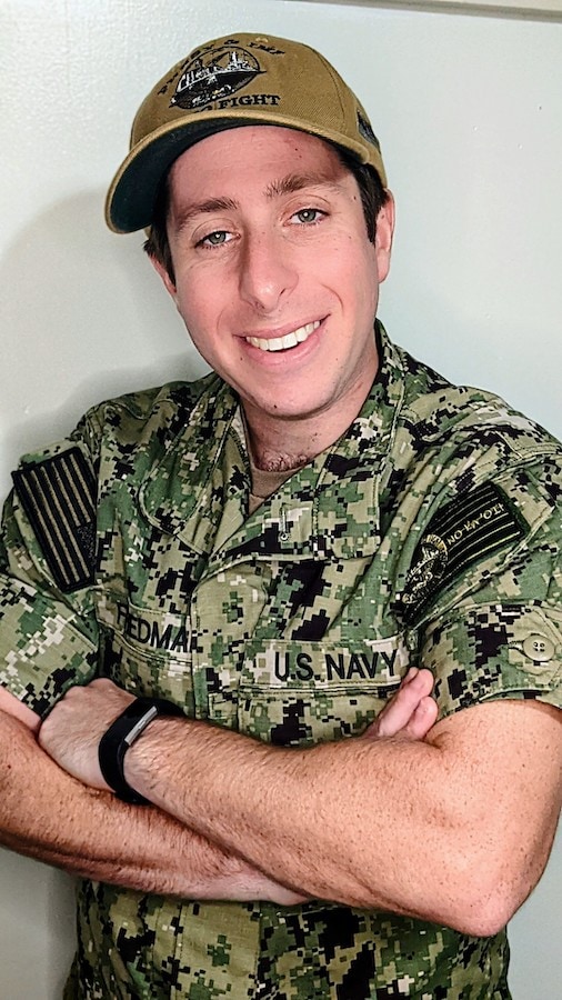 Navy Reserve Petty Officer Second Class and Disneyland Resort Cast Member Ari Friedman