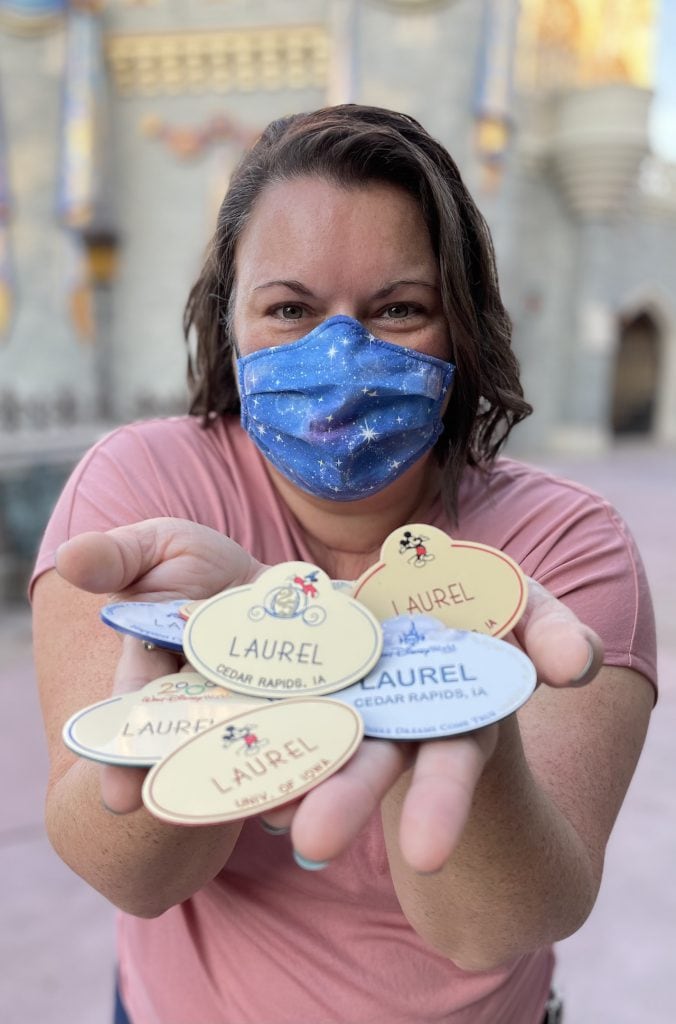 Disney Parks Blog author Laurel Slater with Walt Disney World name tags from her past