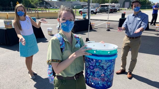 Cast member at Disney’s Animal Kingdom showing her one-of-a-kind compost bucket