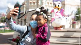 Guests take a selfie at Disneyland Paris