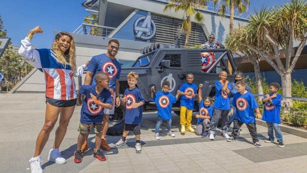 Seattle Seahawks quarterback Russell Wilson with a group of Los Angeles-based kids at Avengers Campus