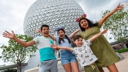 Family in front of spaceship earth at EPCOT