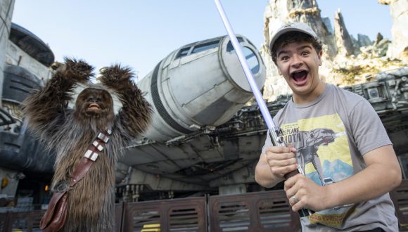 Gaten Matarazzo and Chewbacca at Star Wars: Galaxy’s Edge at Disney’s Hollywood Studios