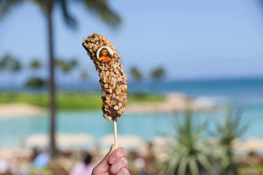 Chocolate Dipped Banana with Macadamia Nuts, featuring an image of Moana made of white chocolate