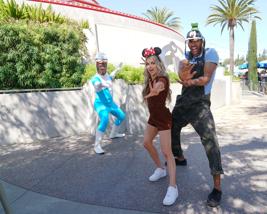 Matt James and Lindsay Arnold take a photo with Frozone before "Dancing With the Stars" Disney Week