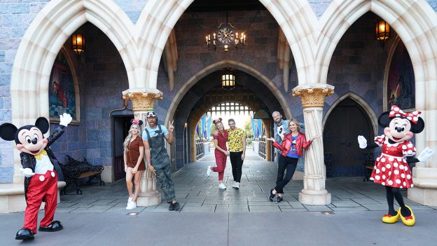 Mickey Mouse, Lindsay Arnold, Matt James, Amanda Kloots, Alan Bersten, Artem Chigvintsev, Melora Hardin and Minnie Mouse take a photo at Disneyland park before "Dancing With the Stars" Disney Week