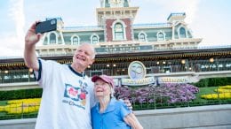 A son celebrates the 50th anniversary of Walt Disney World Resort, Oct. 1, 2021, with his mother, who visited Magic Kingdom Park during its opening year in 1971.