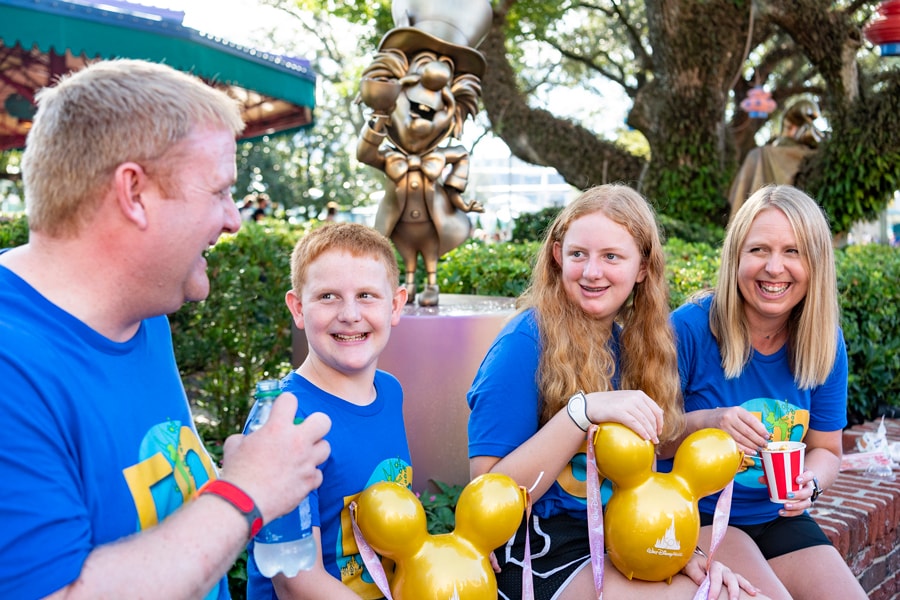A family celebrates the 50th anniversary of Walt Disney World Resort, Oct. 1, 2021, with a souvenir popcorn bucket at Magic Kingdom Park