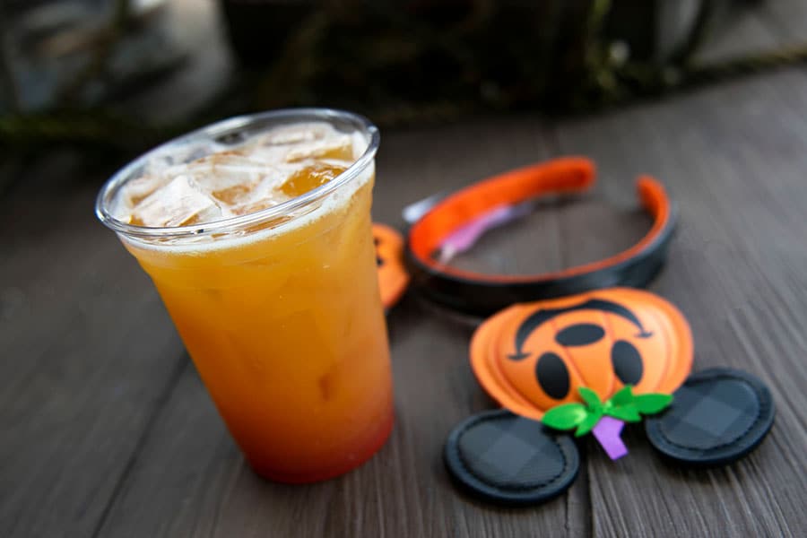 Fall foodie guide Disney Springs 2021 drink with mickey pumpkin headband