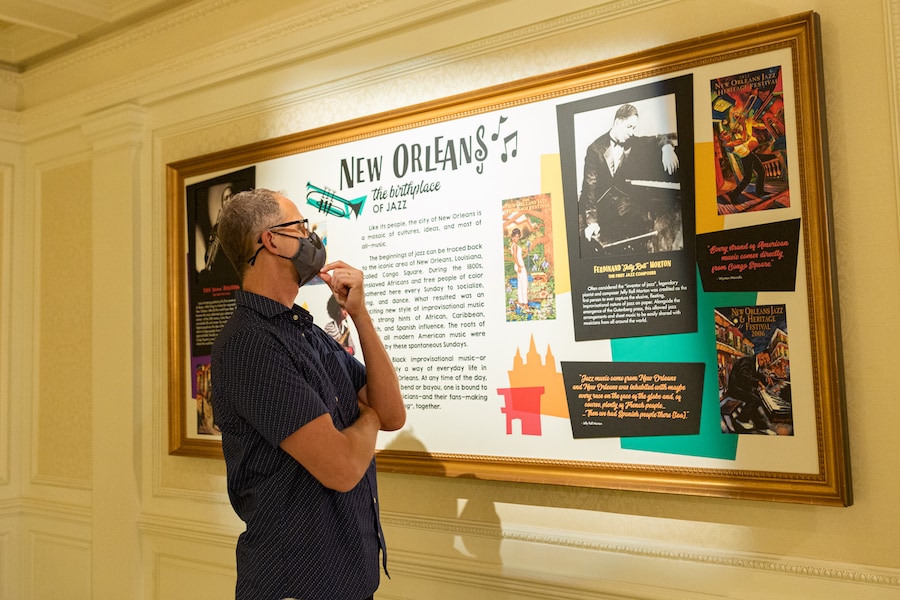Pete Docter, chief creative officer of Pixar Animation Studios tours exhibit at EPCOT