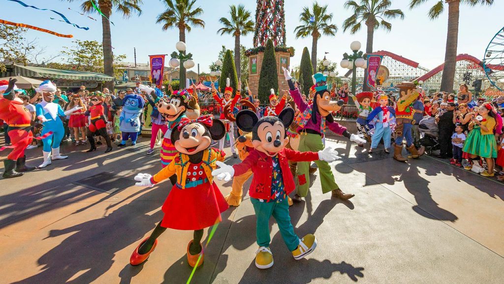 Mickey Mouse and Minnie Mouse celebrating vacation at Disney California Adventure Park