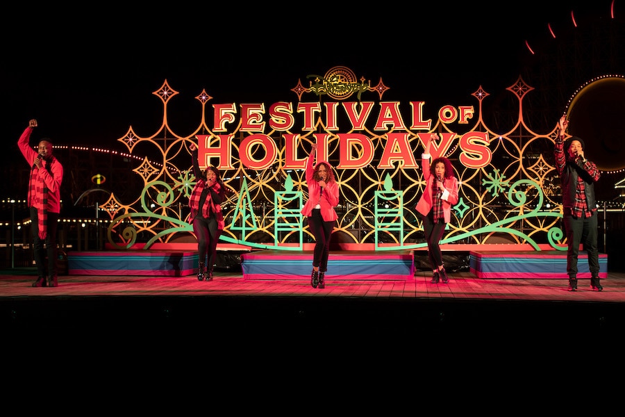The Mistletoes, an a cappella ensemble, celebrates an R&B Christmas and the spirit of Kwanzaa as they perform classic holiday songs with rhythm and soul at the Pacific Wharf Stage and the Palisades Stage during Disney Festival of Holidays at Disney California Adventure Park