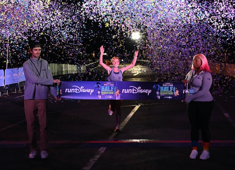 Megan Curham makes runDisney history as the first woman to win overall in a runDisney half marathon twice during the Disney Wine & Dine Half Marathon at Walt Disney World Resort 