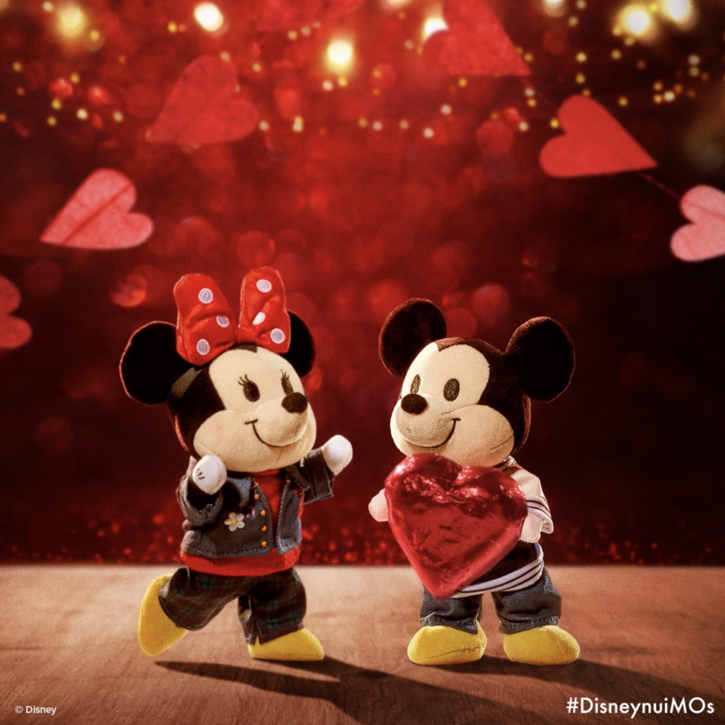 mickey and minnie numbs in valentine's day themed outfits