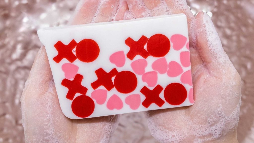 white bar of soap with red and pink hearts