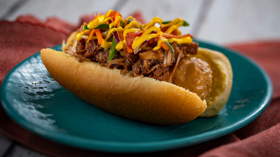 • Plant-based Bratwurst with spicy turmeric aïoli, coffee barbecue jackfruit, and slaw from the Refreshment Outpost