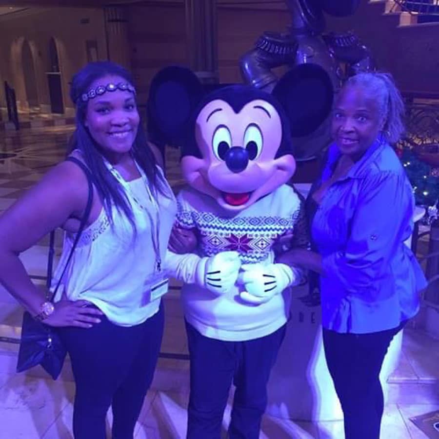 Stephanie and her mom meeting Mickey on the Disney Dream
