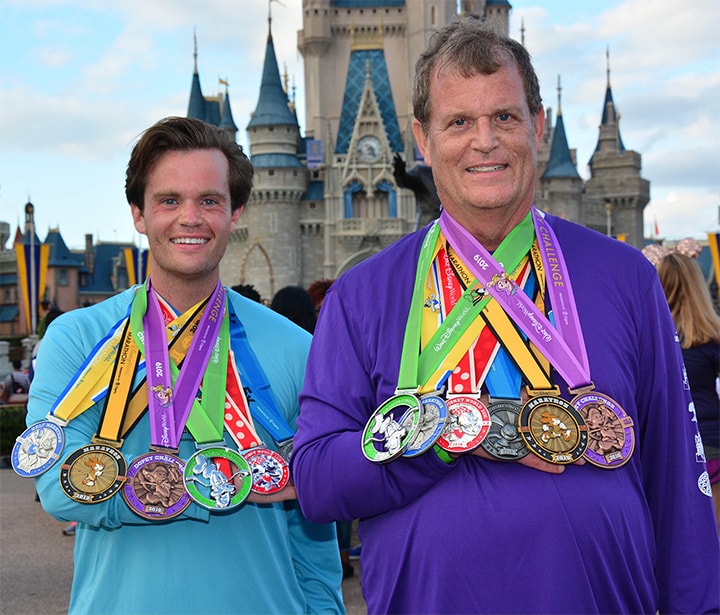 Steve and his dad with their many medals