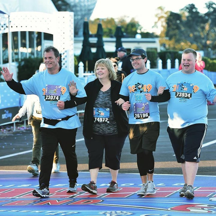 Steve and his family cross the finish line together