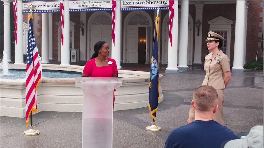 EPCOT Vice President Kartika Rodriguez speaks at U.S. Navy Cmdr. Laura Stegherr’s military promotion ceremony at the American Adventure Pavillion in EPCOT