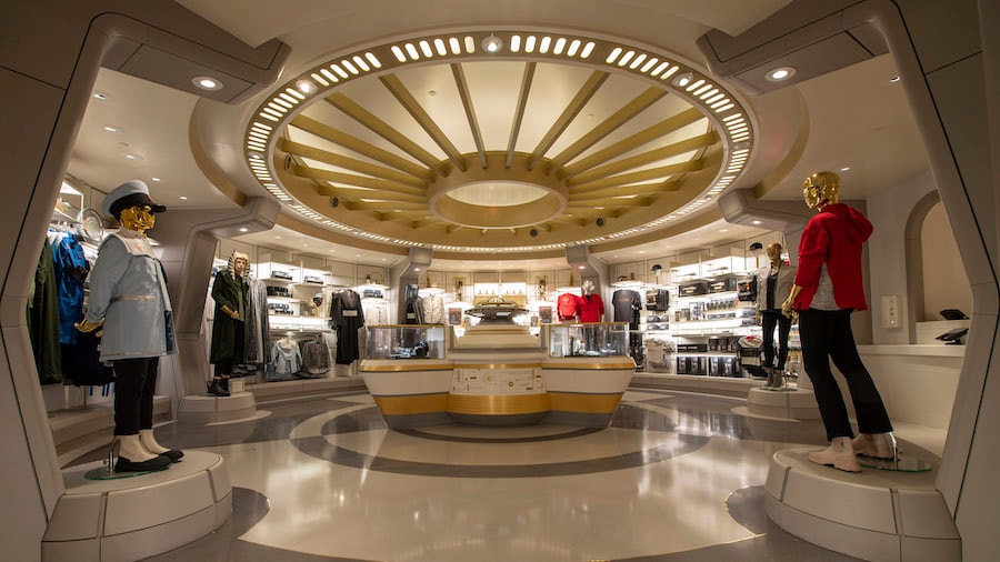 The Chandrila Collection is a boutique off the Atrium of the Halcyon starcruiser where passengers can dress in galactic fashion as part of their stay at Star Wars: Galactic Starcruiser at Walt Disney World Resort 