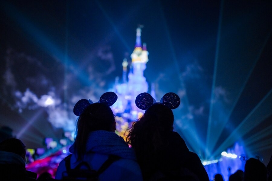 Cast members looking at Disneyland Paris castle