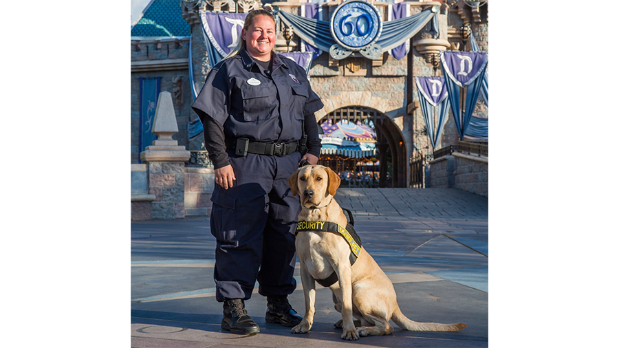 Shannon and Gus Gus in front of Sleeping Beauty Castle