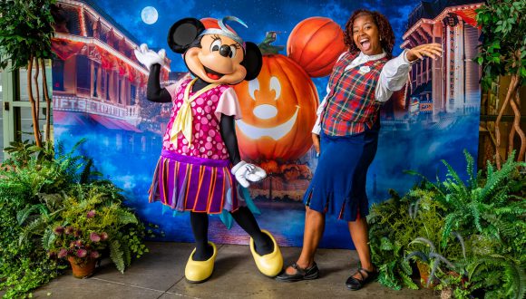 Minnie Mouse strikes a Halloween pose with cast