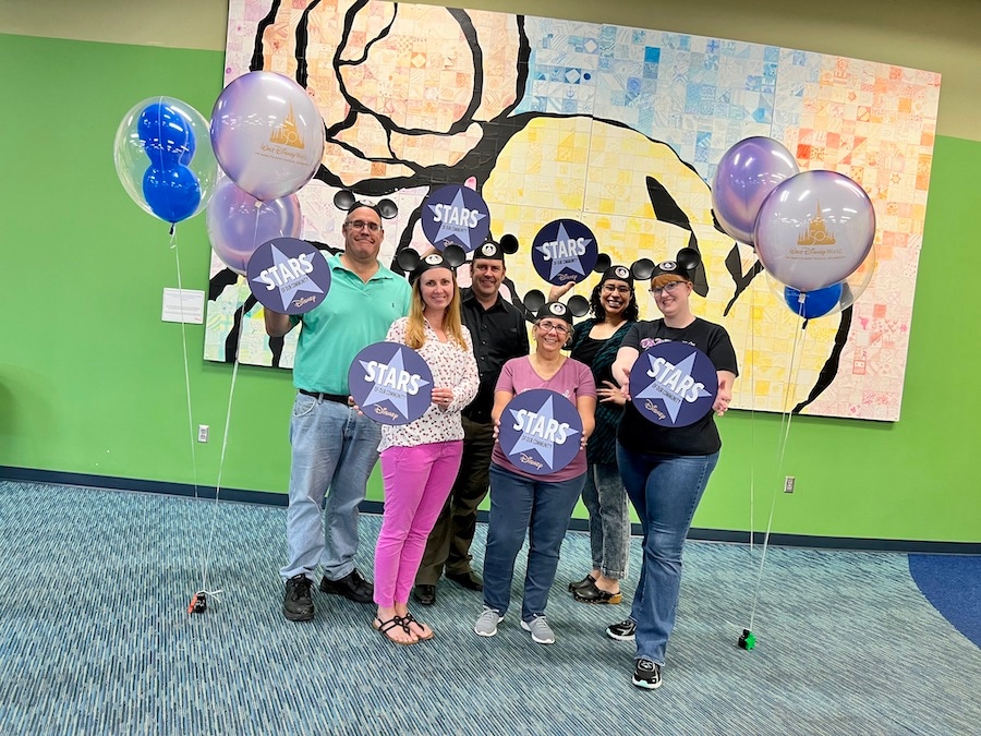 Teachers with balloons