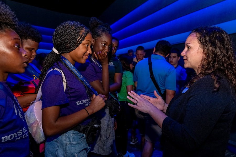 Boys & Girls Clubs students inside of Guardians of the Galaxy: Cosmic Rewind