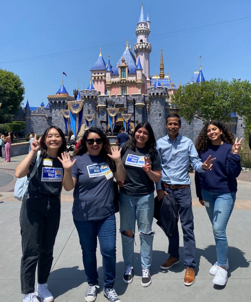 Sergio Contreras, executive director, United for Student Success at Orange County United Way, and United Way leaders at the Disneyland Resort