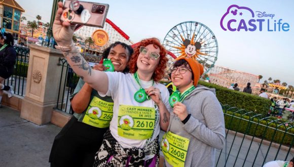 Disney Cast Life - Disneyland Resort cast members snap a selfie at Pixar Pier after completing their race