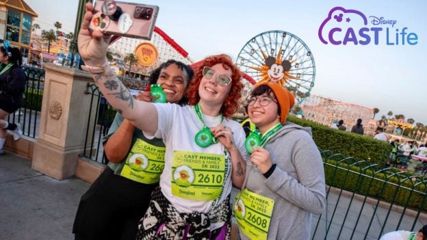 Disney Cast Life - Disneyland Resort cast members snap a selfie at Pixar Pier after completing their race