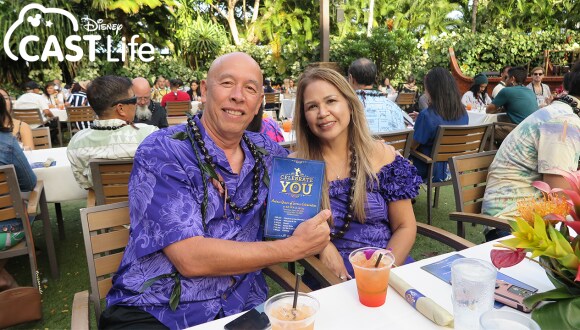 Cast members celebrating their service anniversary