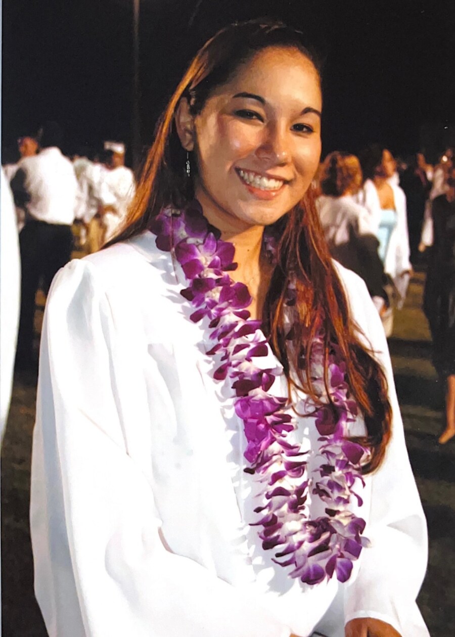 Sarah at graduation with lei