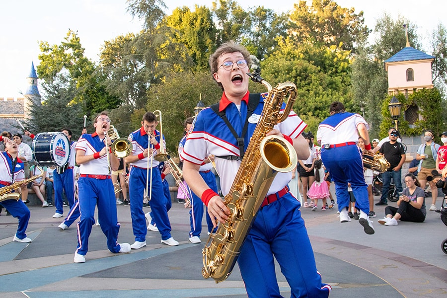 Guests enjoy the band’s debut performance in Disneyland Park on June 21. 