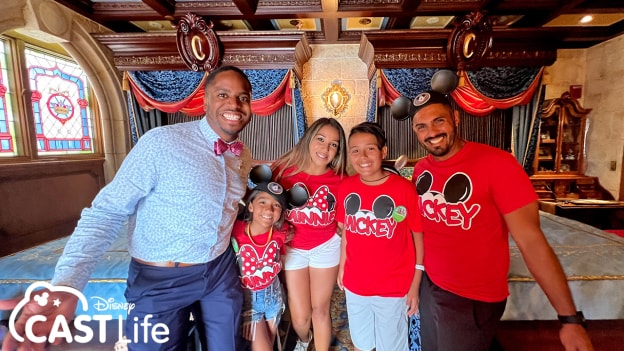 Fabian and family with Walt Disney World Ambassador Raevon