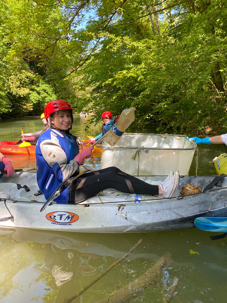 Disneyland Paris Cast Member cleaning up the river