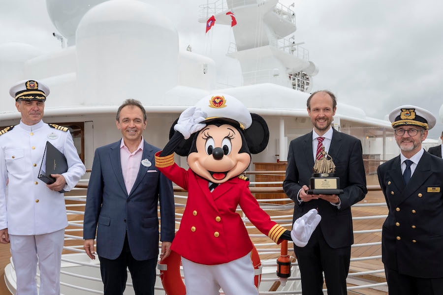 Disney Cruise Line presenting Meyer Werft with an elegant Cinderella statuette