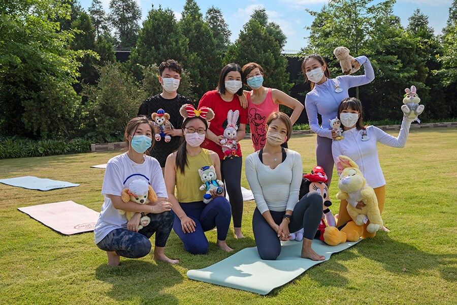 Cast members at Shanghai Disney Resort celebrate International Yoga Day