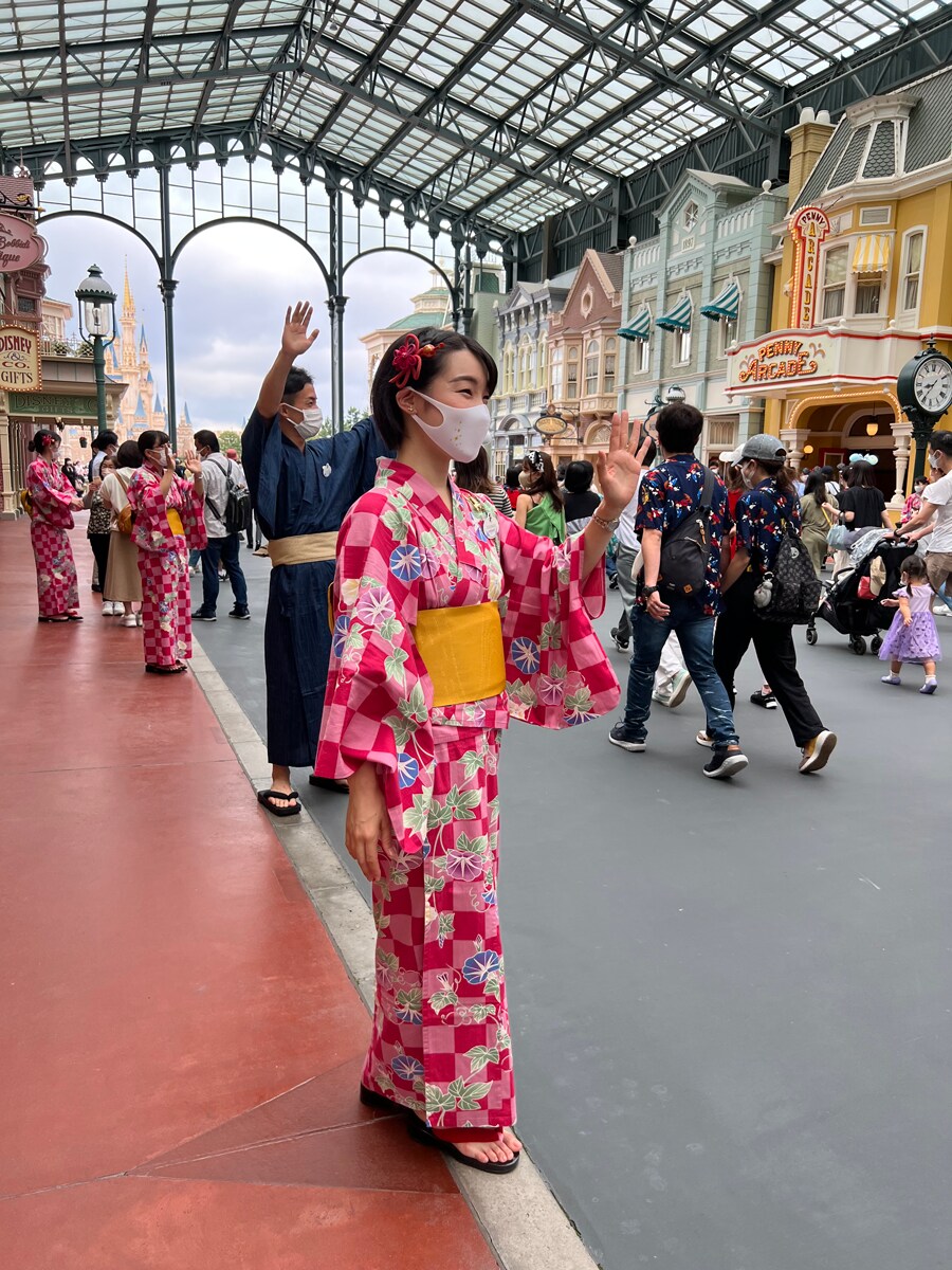 Mika waving at guests at Tokyo Disneyland