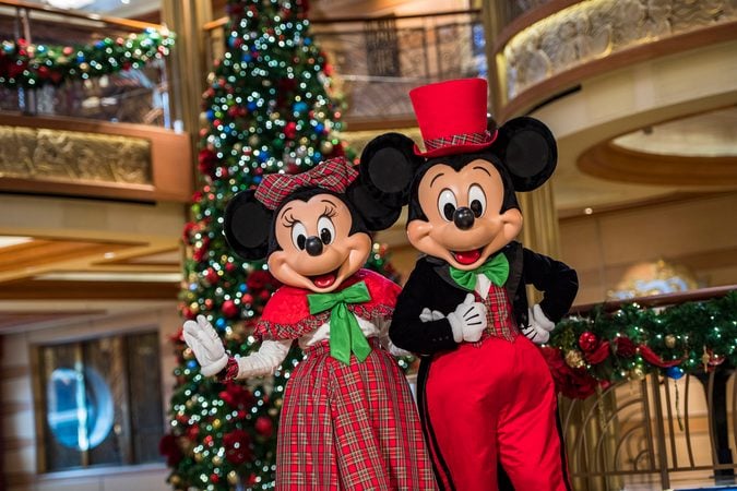 Very Merrytime Cruises, with Mickey Mouse and Minnie Mouse dressed in festive attire