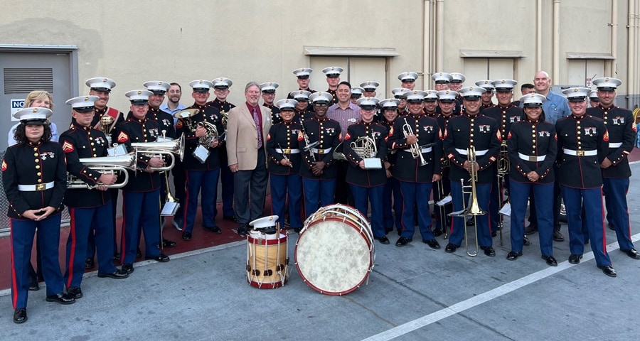 Ariel Elias (middle, second row) and SALUTE BERG leaders meet 1st Division Marine Band