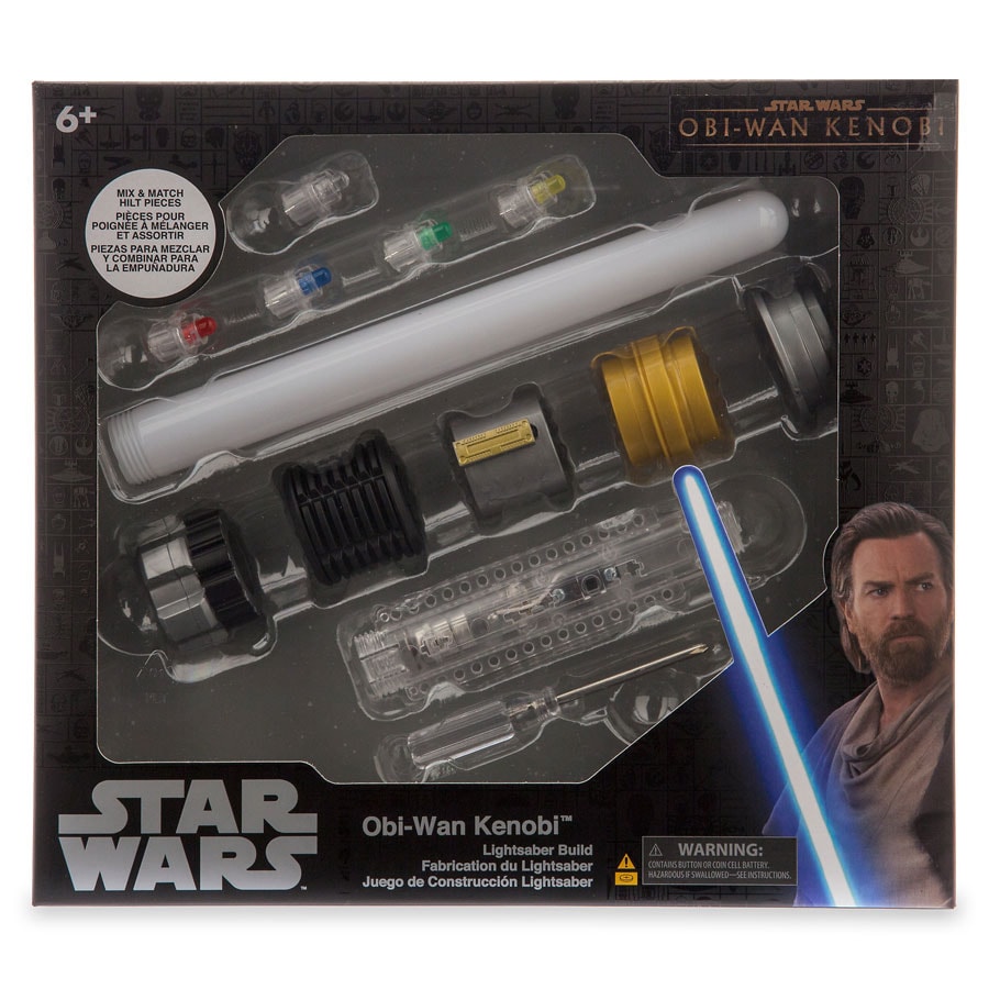 Lightsaber toy build kit — complete with mix-and-match hilt pieces and a light-up feature