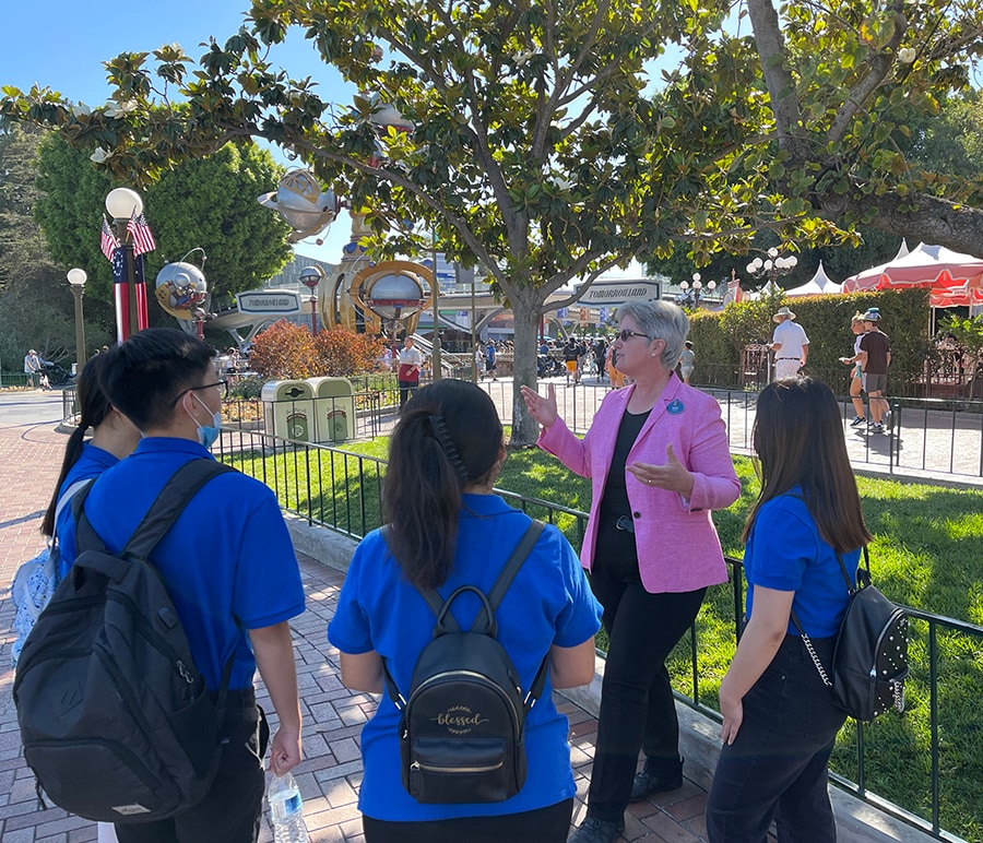 Duty Manager Mary Cobb challenges Jimmy, Sarah, and other AIME students to look at Disneyland park in a new way