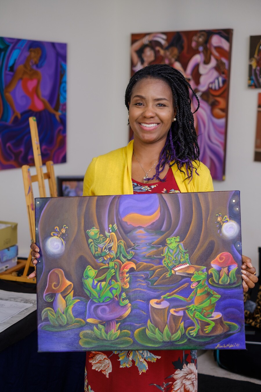Sharika Mahdi holds painting
