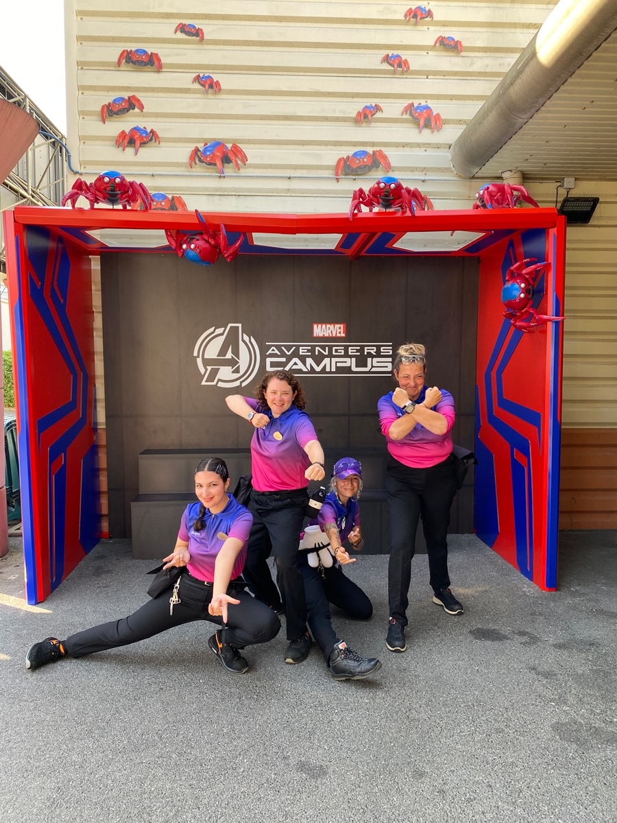 Disneyland Paris Avengers Campus cast members in front of Spider-Bot selfie spot